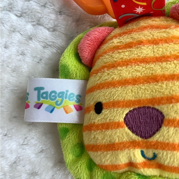 Taggies Plush Lion Squeeze Squeaker Hanging Stuffed Animal Toy - Picture 5 of 9